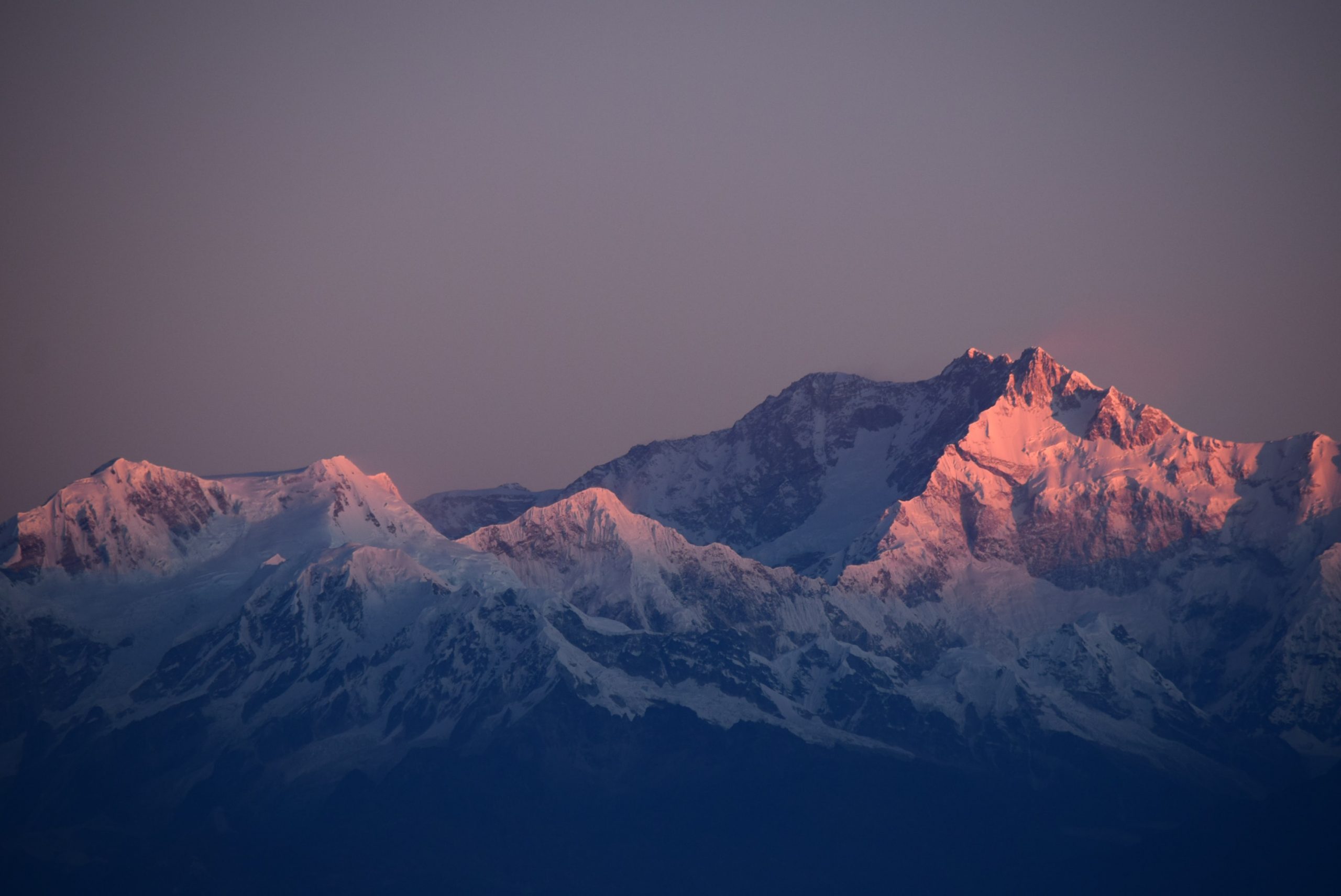 sun setting on mountains